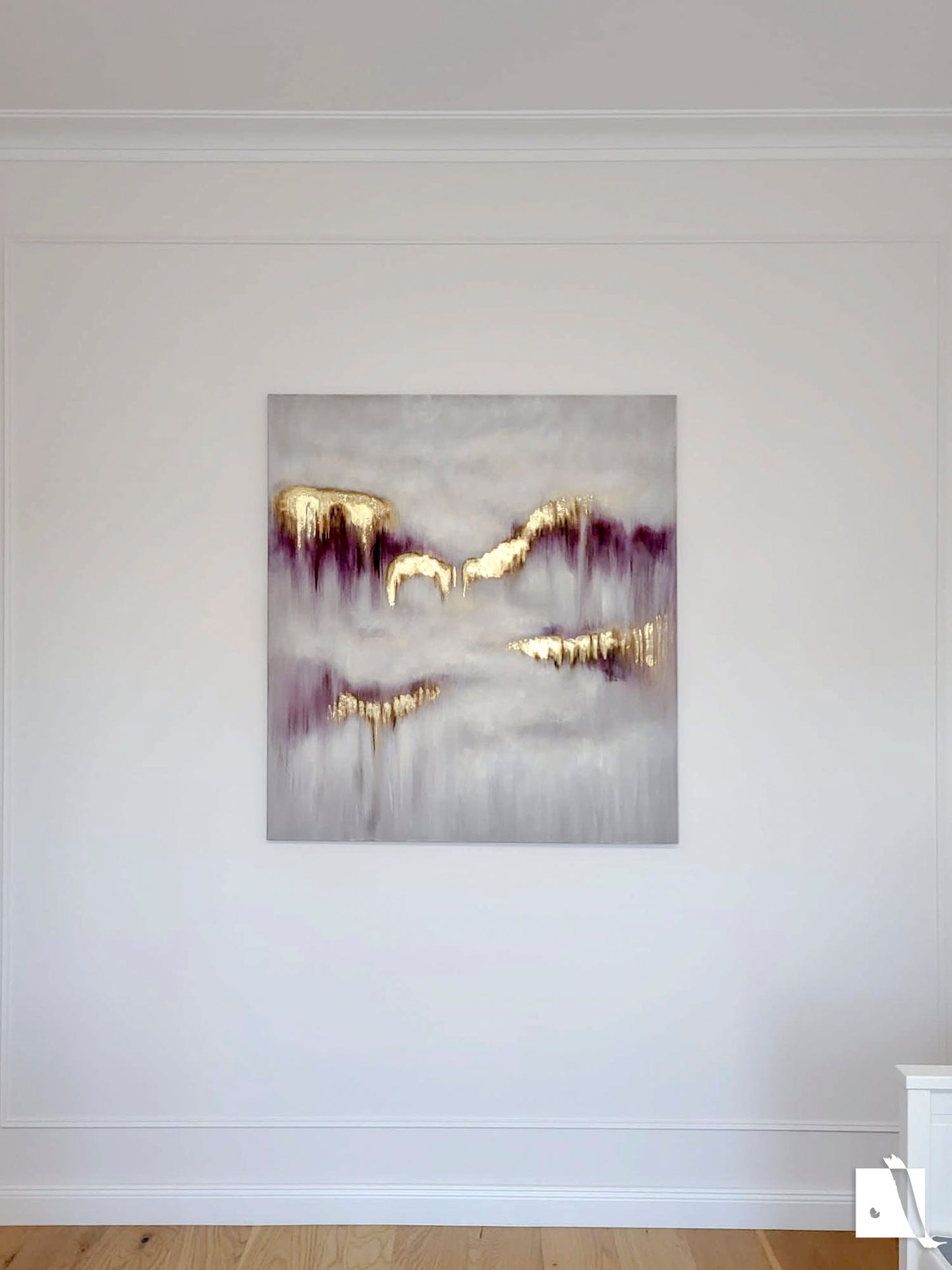 An abstract figurative painting with golden leaf inserts and acrylic paint, predominantly in shades of purple and white, displayed on a wall without a frame.