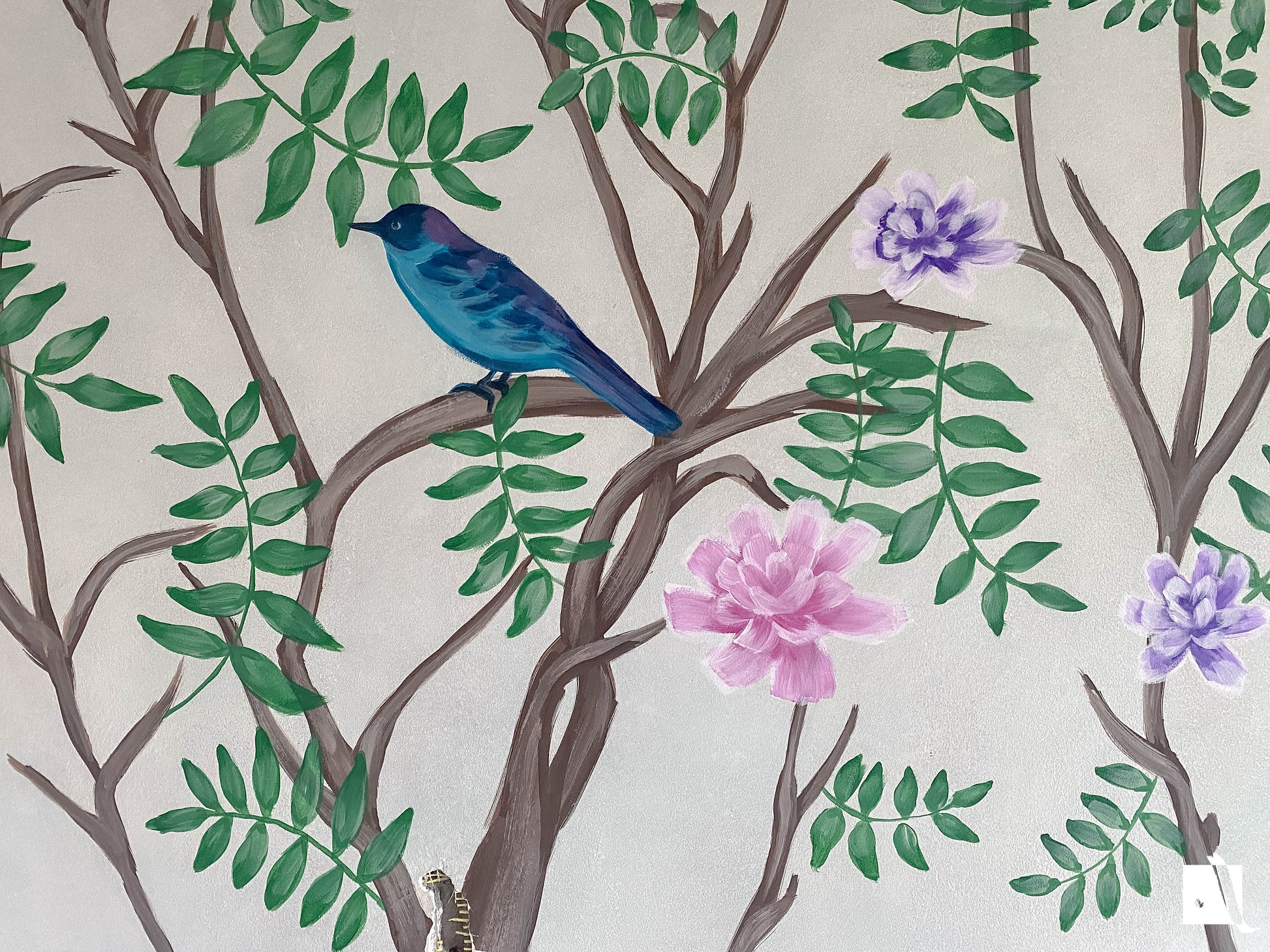 Wall mural of birds and trees on a wall with a light background