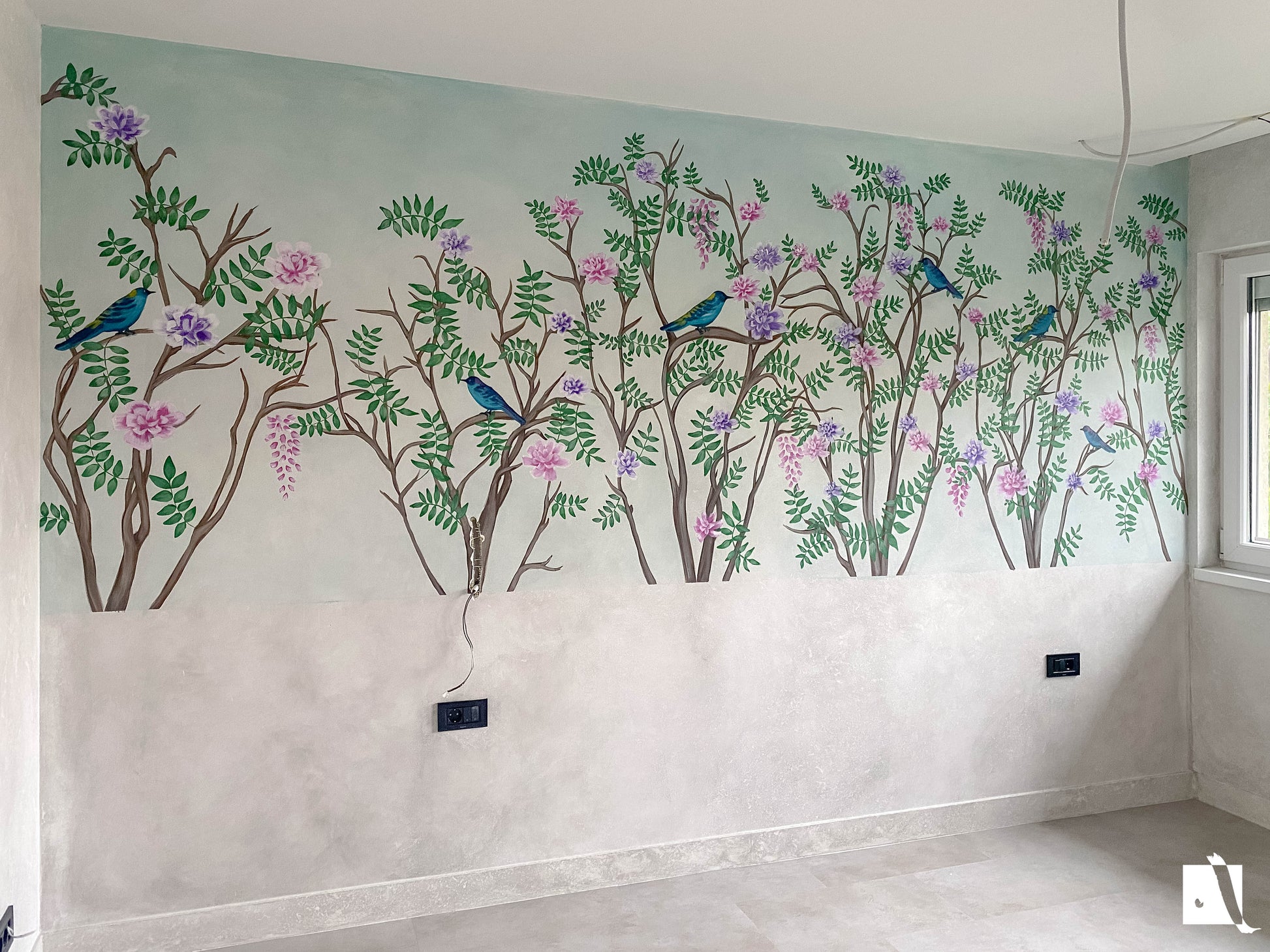 Wall mural of birds and trees on a wall with a light background