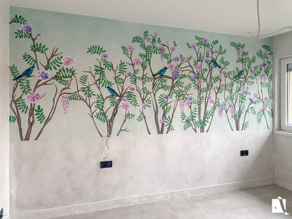 Wall mural of birds and trees on a wall with a light background