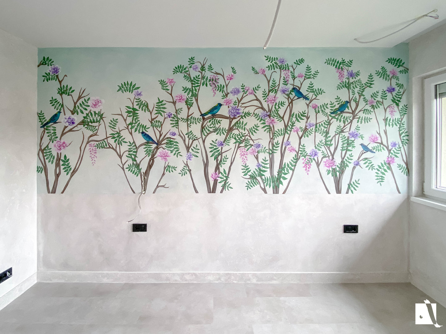 Wall mural of birds and trees on a wall with a light background