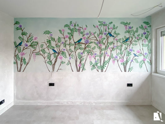 Wall mural of birds and trees on a wall with a light background