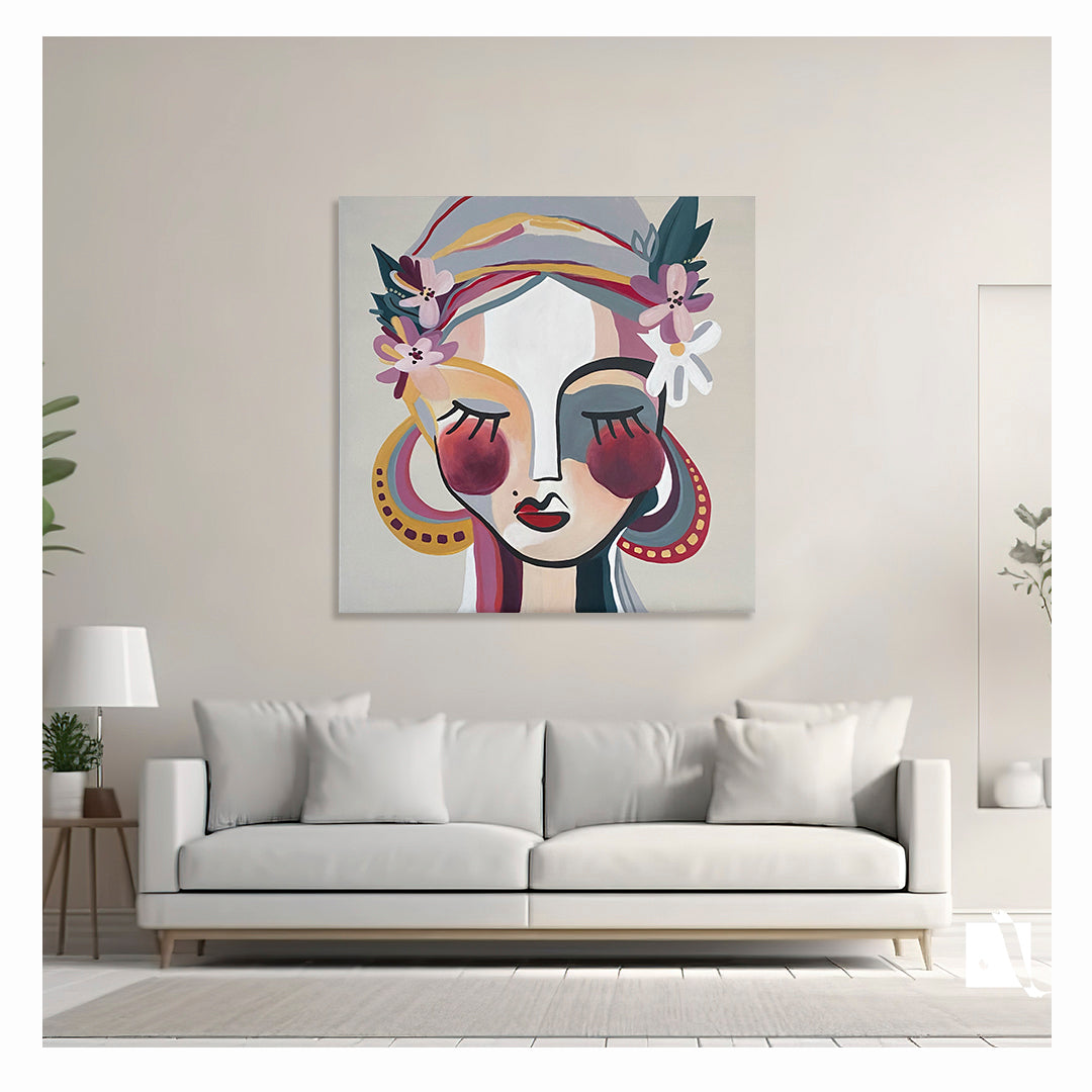 pictura decorativa tip portret realizata manual portret feminin cu flori nuante de crem, roz, ocru si verde eucalipt in context de amenajare moderna